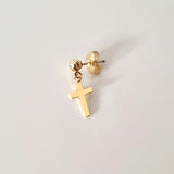minimalist gold stud earring with the small dangle cross